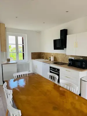 Cuisine ou kitchenette dans l'établissement Joli Logis