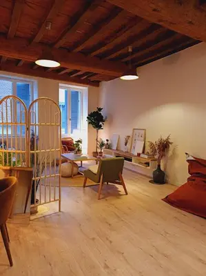 Coin salon dans l'établissement L'Appartement Pasteur