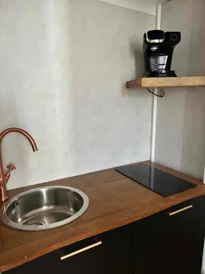 Cuisine ou kitchenette dans l'établissement Chez Kapameï