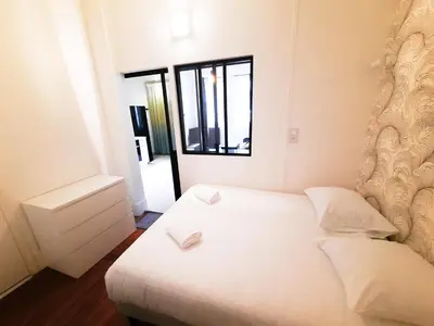 Un ou plusieurs lits dans un hébergement de l'établissement Le Buffon - Apt 2 Personnes, 1 ch, Centre ville