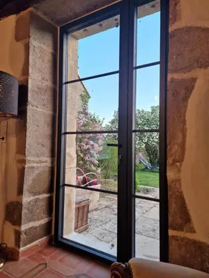 Balcon ou terrasse dans l'établissement MAISON EN PIERRE type CHATEAU