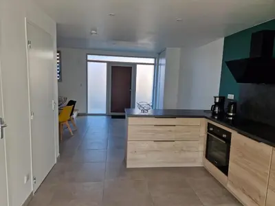 Cuisine ou kitchenette dans l'établissement Charmante maison de village