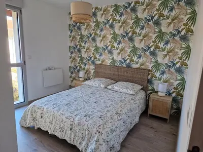 Un ou plusieurs lits dans un hébergement de l'établissement Charmante maison de village