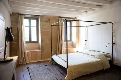 Un ou plusieurs lits dans un hébergement de l'établissement Maison de la fontaine