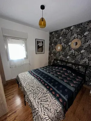 Un ou plusieurs lits dans un hébergement de l'établissement Le 8 appartement - Le Duplex III - parking sur demande