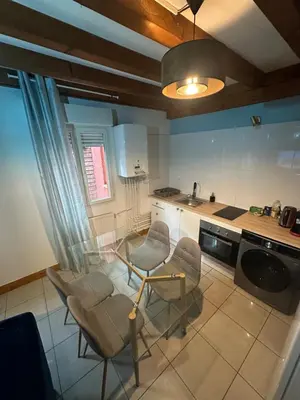 Cuisine ou kitchenette dans l'établissement Le 8 appartement - Le Duplex III - parking sur demande