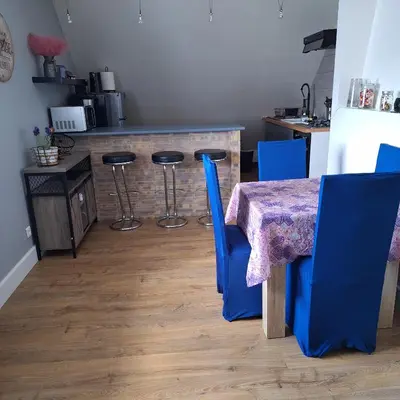 Cuisine ou kitchenette dans l'établissement Sous un charmant toit