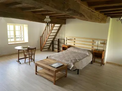 Un ou plusieurs lits dans un hébergement de l'établissement Le Haut des Lariers Gîte