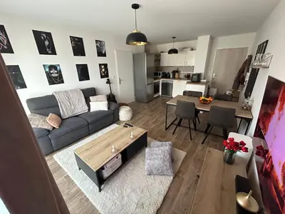 Coin salon dans l'établissement Superbe nid douillet 42m avec balcon et parking