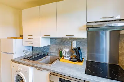 Cuisine ou kitchenette dans l'établissement Le 28 C chouette - Spacieux - Box privé - Ascenseur - Centre