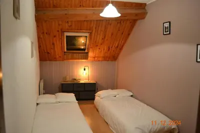 Un ou plusieurs lits dans un hébergement de l'établissement Gîte Le Cabanac