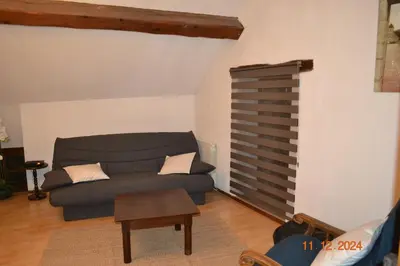 Coin salon dans l'établissement Gîte Le Cabanac
