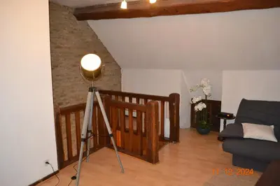 Coin salon dans l'établissement Gîte Le Cabanac