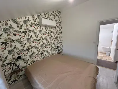 Un ou plusieurs lits dans un hébergement de l'établissement Le Clos des Cadots - Apt 2ème Sud