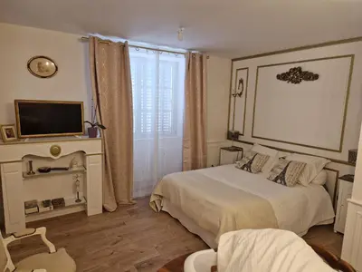 Un ou plusieurs lits dans un hébergement de l'établissement Studio luxe Rdc 