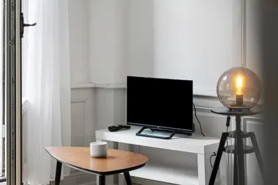 Télévision ou salle de divertissement dans l'établissement Confort & Calme - Appartement Centre Historique - Tout équipé