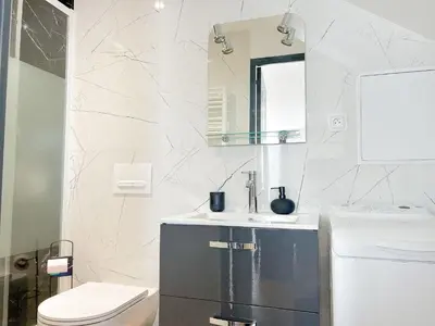 Salle de bains dans l'établissement Grand studio spacieux