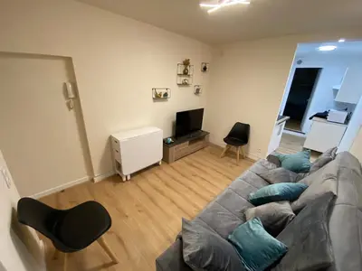 Coin salon dans l'établissement Appartement au coeur de Dole