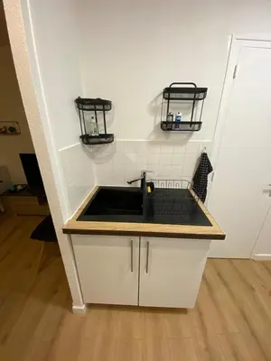 Cuisine ou kitchenette dans l'établissement Appartement au coeur de Dole