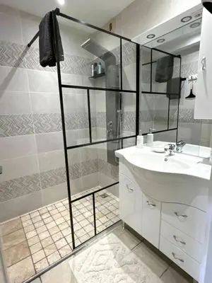 Salle de bains dans l'établissement Le Poisat