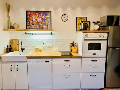 Cuisine ou kitchenette dans l'établissement La Maison des Pérolles