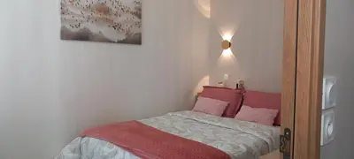 Un ou plusieurs lits dans un hébergement de l'établissement Dijon en famille - cosy, équipé bébé - 5 mn centre ville