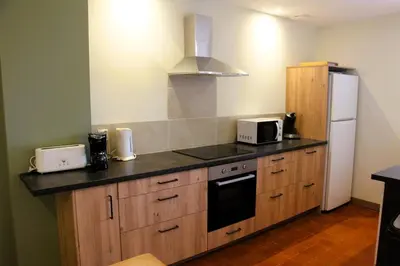 Cuisine ou kitchenette dans l'établissement La Bauderie
