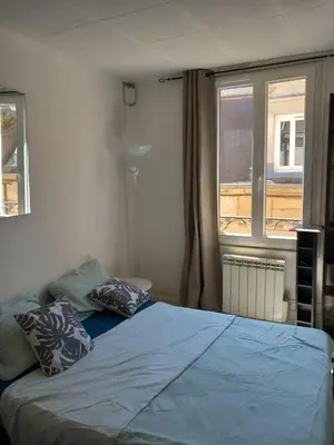 Un ou plusieurs lits dans un hébergement de l'établissement Le jade Appartement T1 centre historique