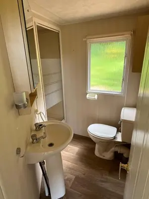 Salle de bains dans l'établissement Camping le Faulion