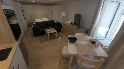 Cuisine ou kitchenette dans l'établissement L'Abeille Du Moulin
