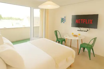 Un ou plusieurs lits dans un hébergement de l'établissement Le Botanic - Appartement de charme à Digoin