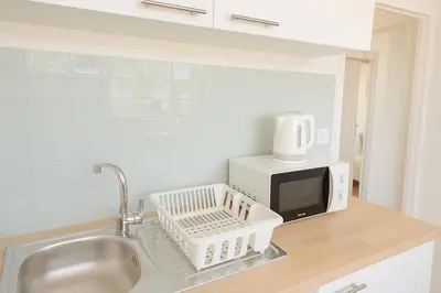 Cuisine ou kitchenette dans l'établissement Le Botanic - Appartement de charme à Digoin