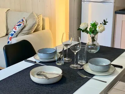 Coin salon dans l'établissement Petite Maison Cosy