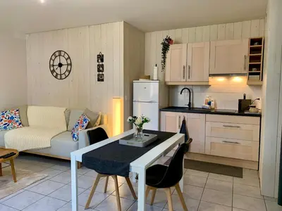 Cuisine ou kitchenette dans l'établissement Petite Maison Cosy