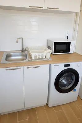 Cuisine ou kitchenette dans l'établissement Le Blue Hole - Appartement de charme Digoin