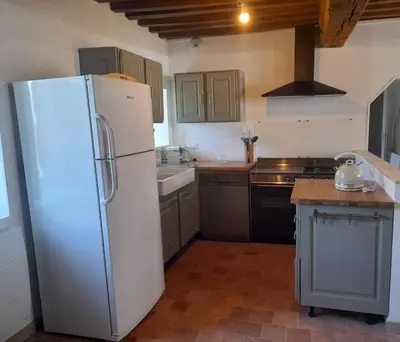 Cuisine ou kitchenette dans l'établissement Maison DU VERGER