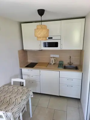Cuisine ou kitchenette dans l'établissement L'Impasse du Jura