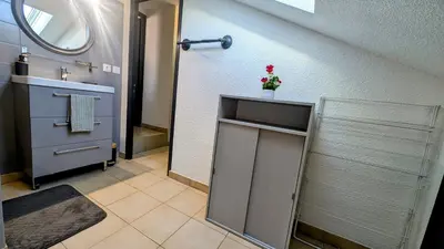 Salle de bains dans l'établissement Le Bedugue