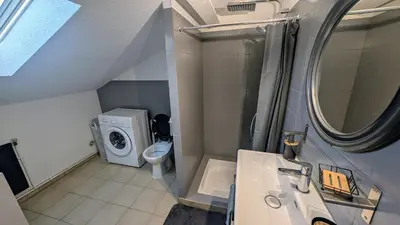 Salle de bains dans l'établissement Le Bedugue