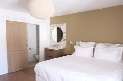 Un ou plusieurs lits dans un hébergement de l'établissement La Petite Maison