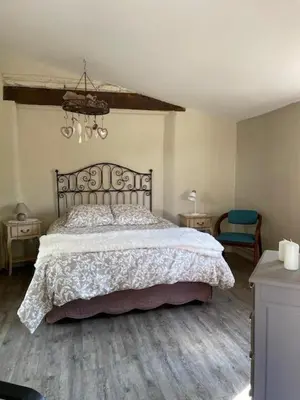 Un ou plusieurs lits dans un hébergement de l'établissement Maison Revenu