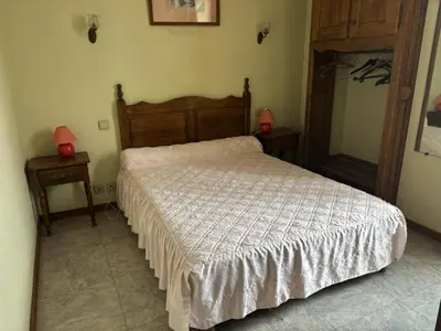 Un ou plusieurs lits dans un hébergement de l'établissement hotel Loriot