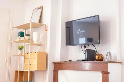 Télévision ou salle de divertissement dans l'établissement Le Ptit St Pierre - Studio en Hyper Centre