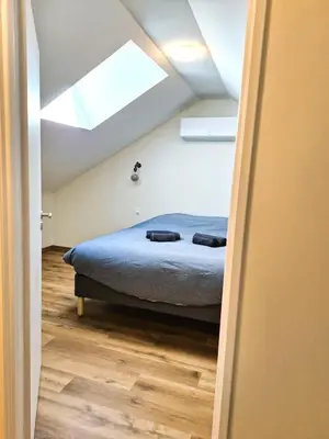 Un ou plusieurs lits dans un hébergement de l'établissement Appartement 3 chambres
