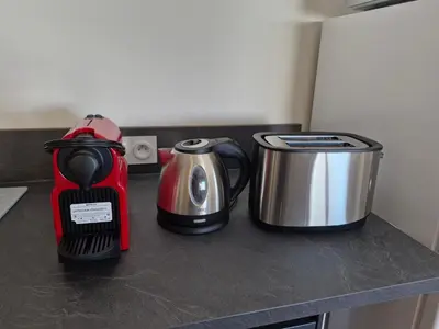 Cuisine ou kitchenette dans l'établissement Appartement 3 chambres