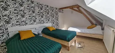 Un ou plusieurs lits dans un hébergement de l'établissement Gîte du Chaudron