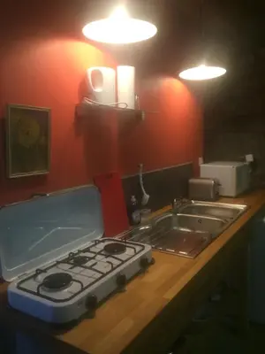 Cuisine ou kitchenette dans l'établissement Cottage