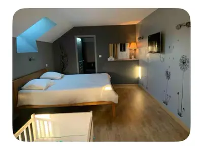 Un ou plusieurs lits dans un hébergement de l'établissement La maison du bonheur au cœur du Morvan