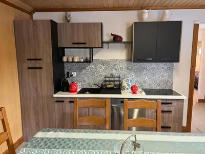 Cuisine ou kitchenette dans l'établissement Le bureau