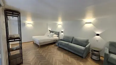 Un ou plusieurs lits dans un hébergement de l'établissement La mezzanine by Vindihouses
